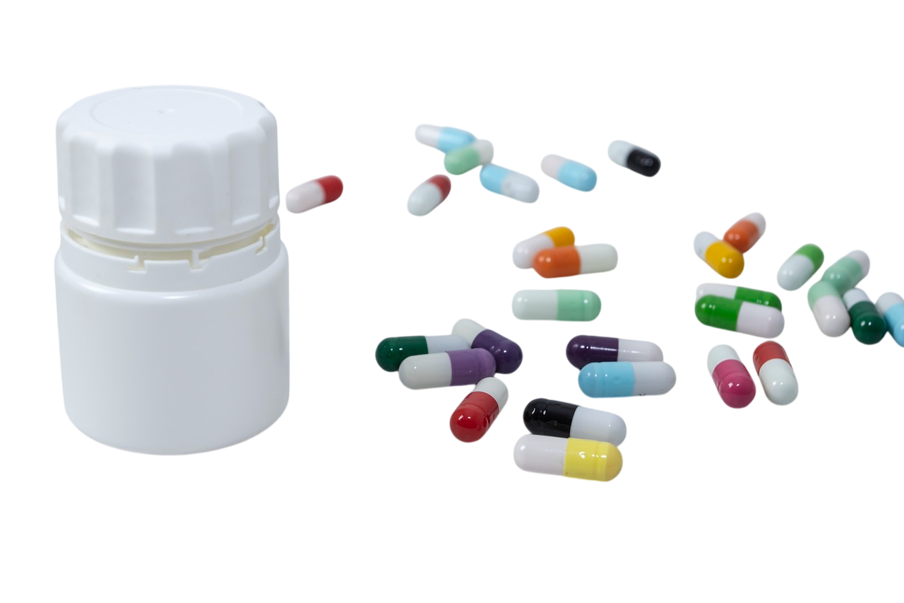Our Services A white medicine bottle with colorful capsules, representing preventive healthcare and general medicine at Al Farooq Polyclinic, Oman. Providing expert medical consultations, prescriptions, and preventive treatments for better health and wellness.